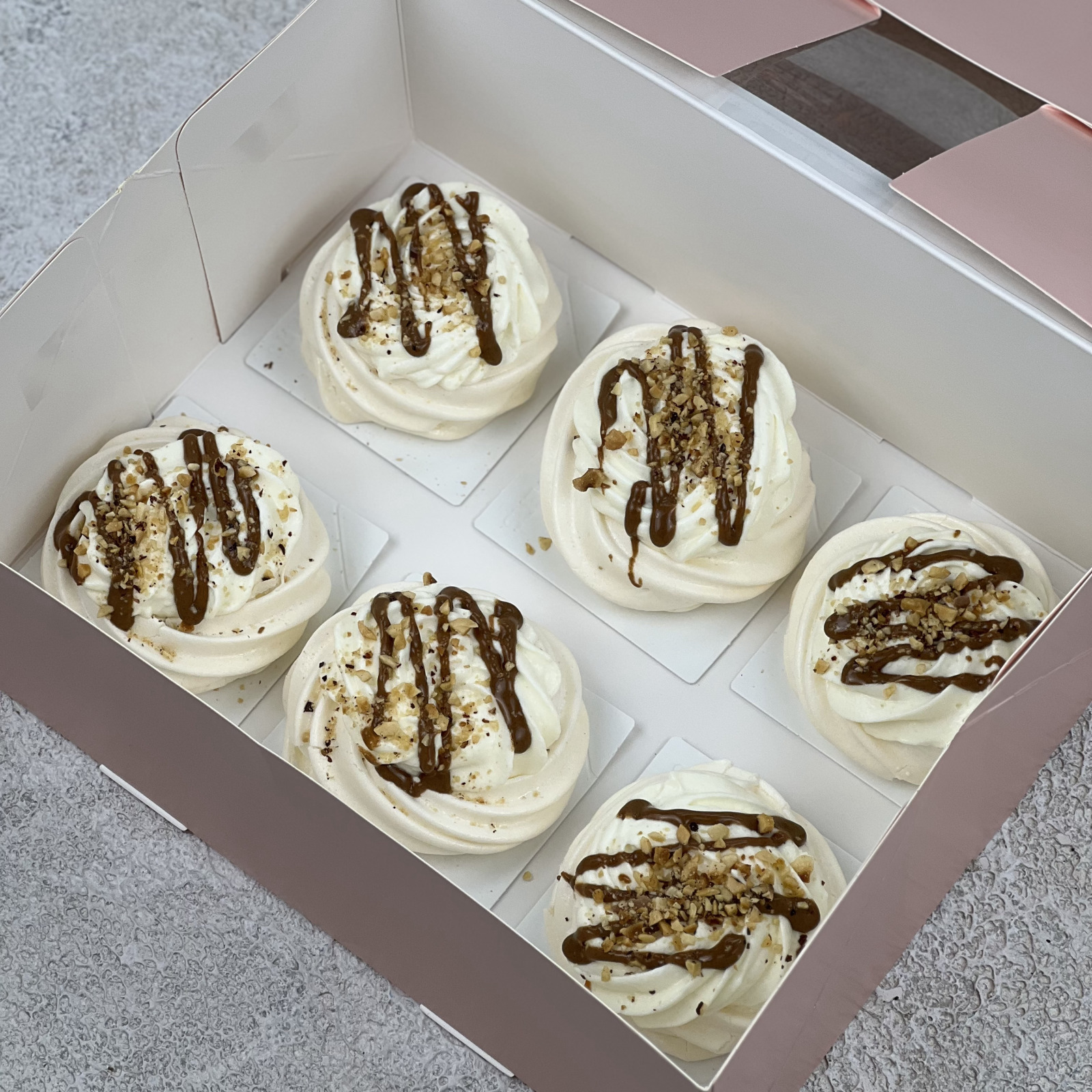 Set of 6 Individual Desserts Pavlova Hazelnut Caramel. Meringue roll and Pavlova 