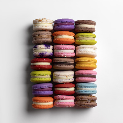 Our carefully crafted macarons, baked with 20% less sugar than the original recipe, sandwiching a delicious creamy filling that is bound to delight your taste senses.